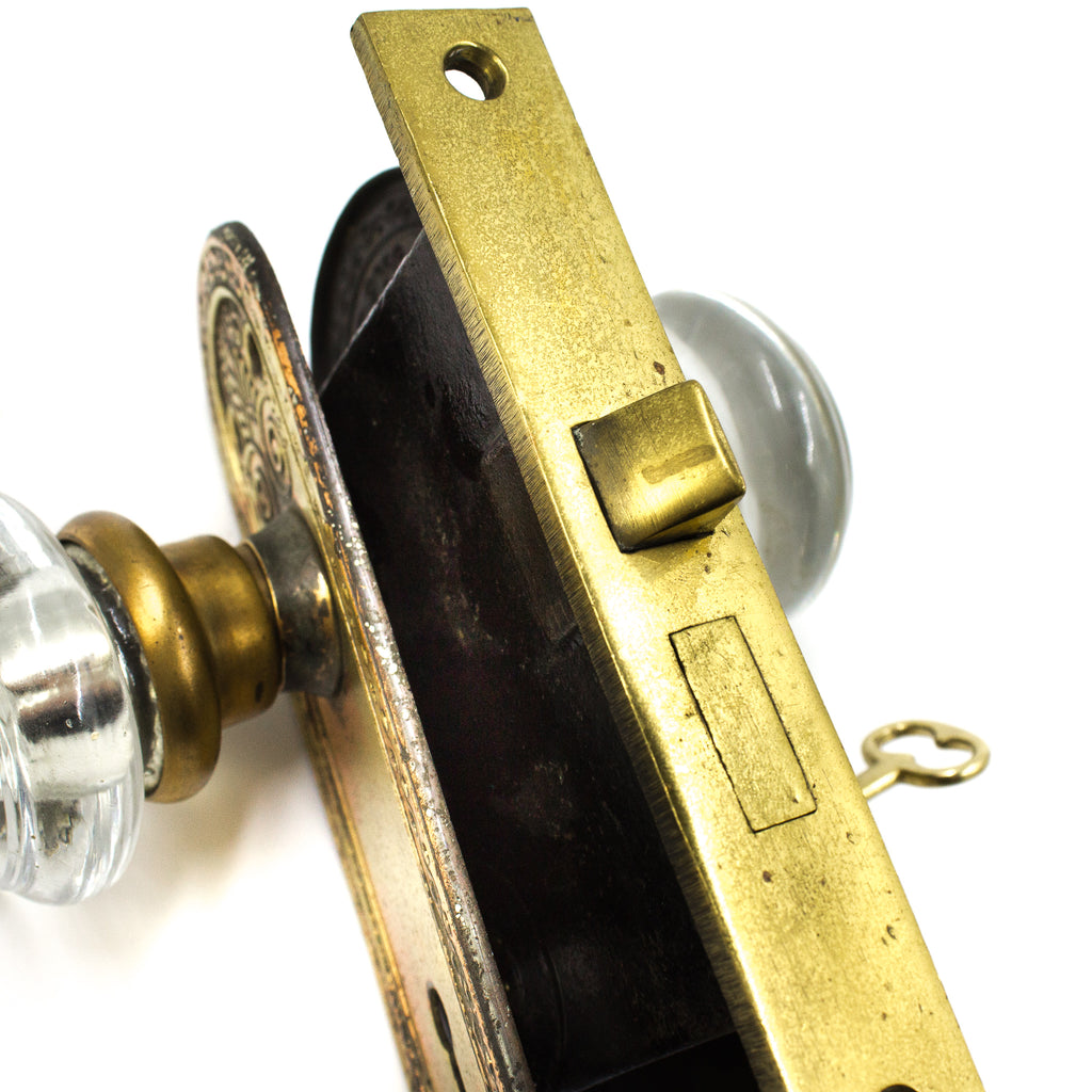 this is a side view of the lock on the face of the mortise on a vintage dexter door knob set