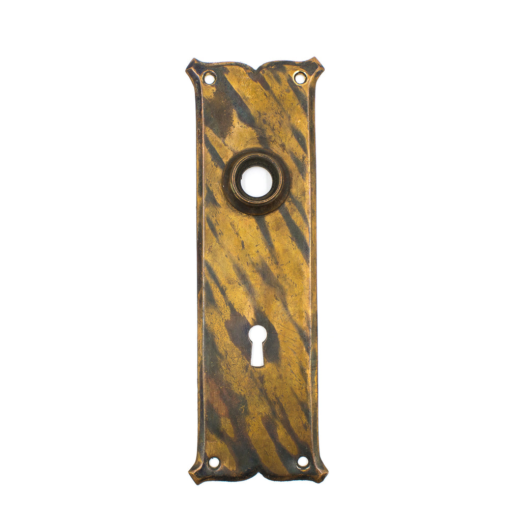 this is a vintage 1920s striped japanned escutcheon