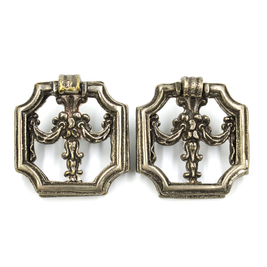 this is a pair of antique vintage square shaped ring pulls