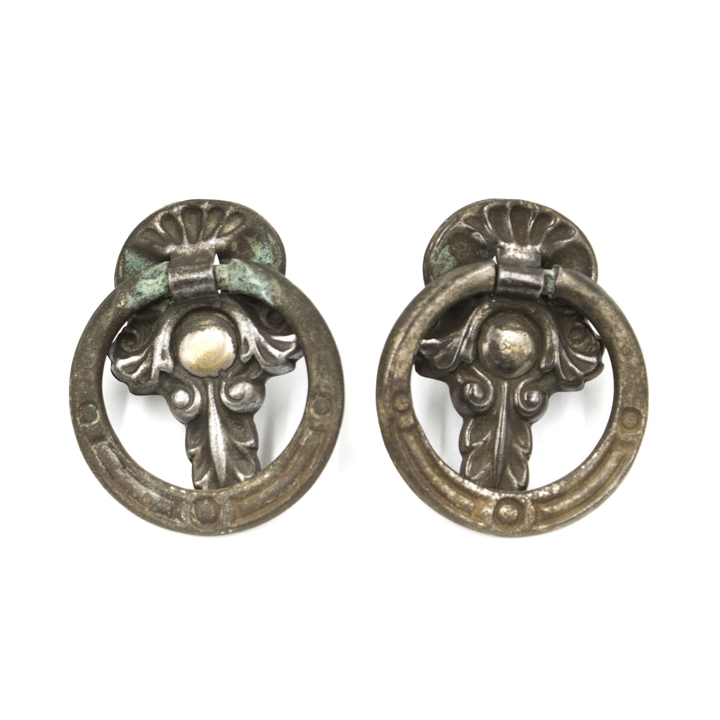 this is a pair of two antique ring pulls