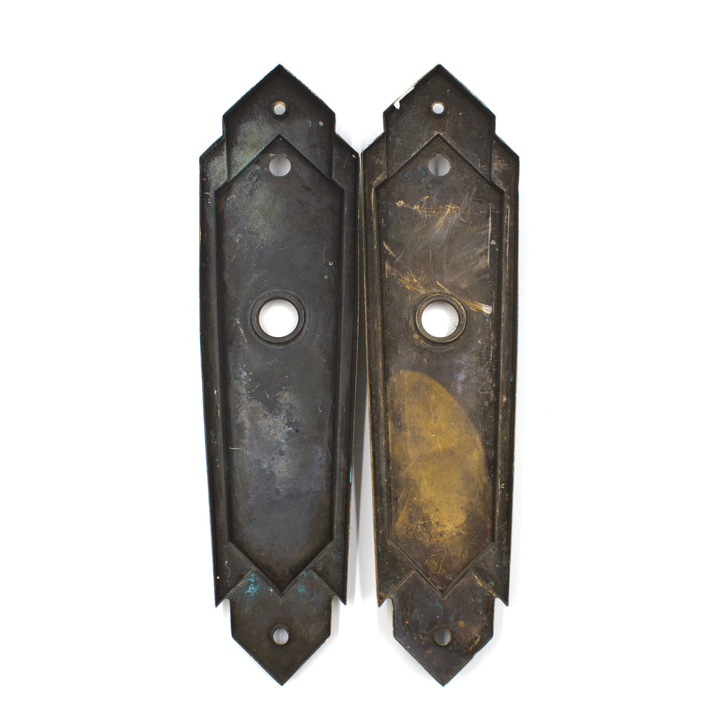 this is a picture of the backs of a pair of vintage mid century art deco escutcheons