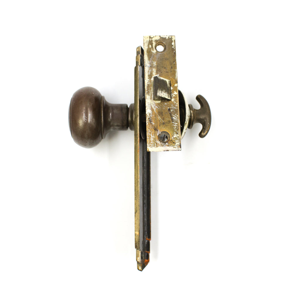 this is a picture of the lock on a vintage art deco door knob set