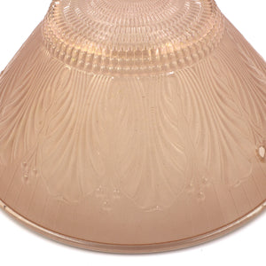 this is the detail of floral design on a vintage mid century pink glass three chain shade