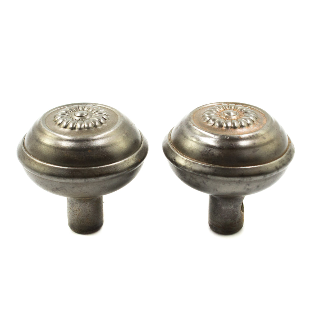 this is a picture of a pair of two antique victorian door knobs 