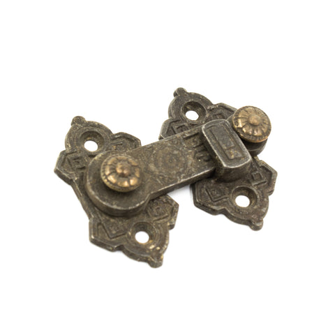 this is an antique victorian iron window latch