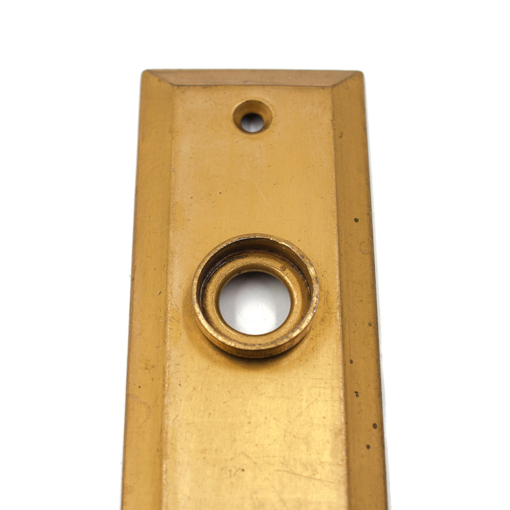 this is the top half of a vintage bronze screen door plate