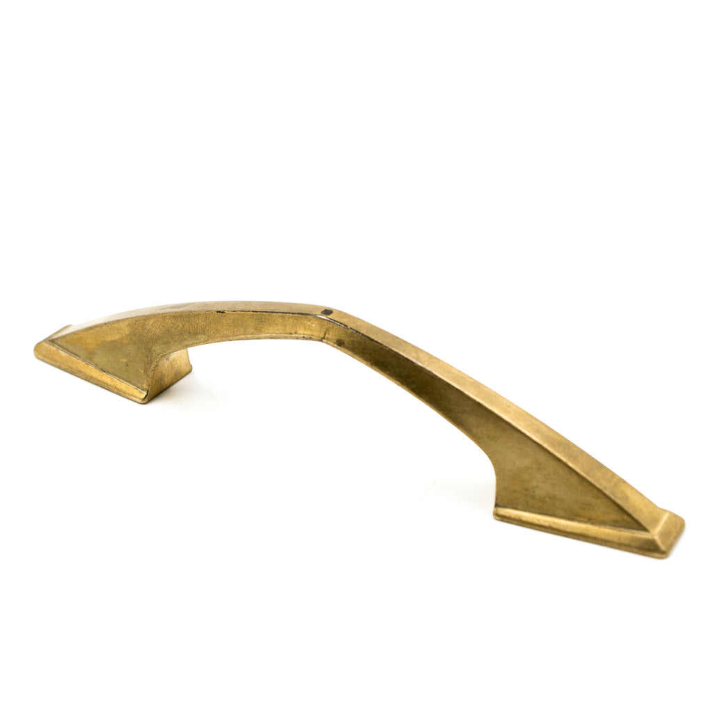 this is a vintage bronze angled cabinet or drawer pull