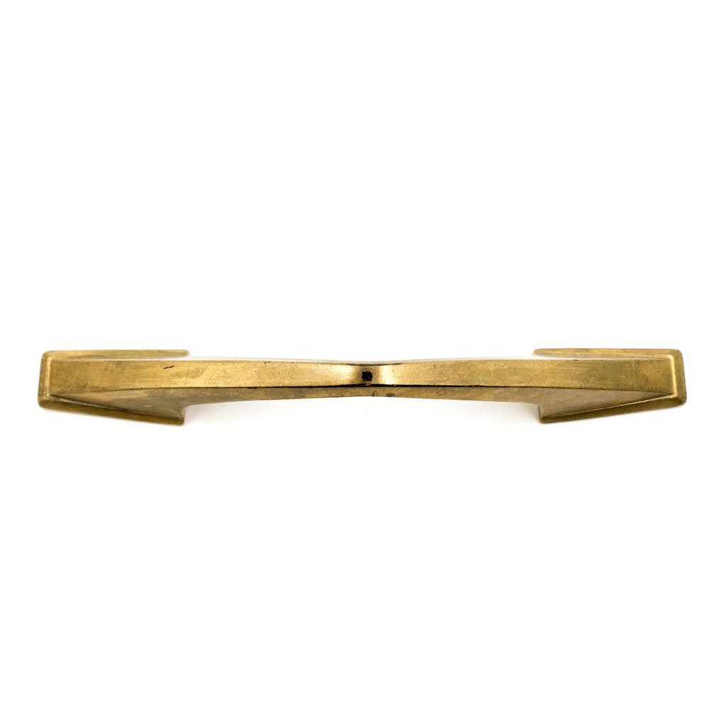 This is a bird's eye view of a vintage bronze cabinet or drawer pull