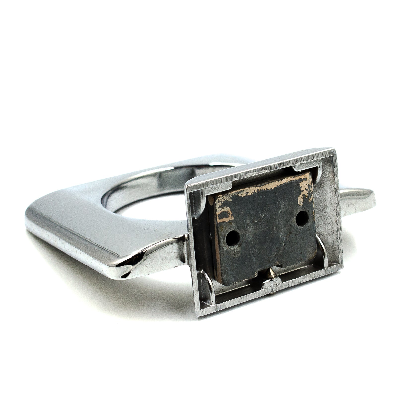 A chrome wall-mounted cup holder