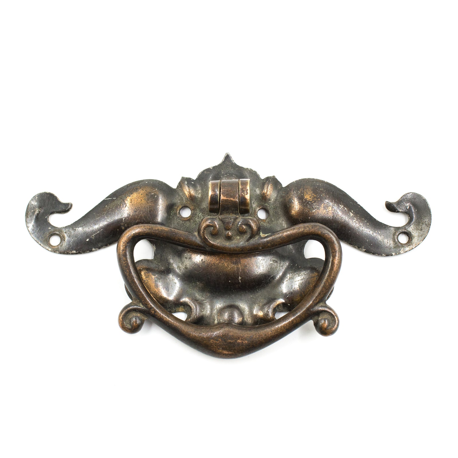 This is a vintage art nouveau drawer pull with a japanned finish