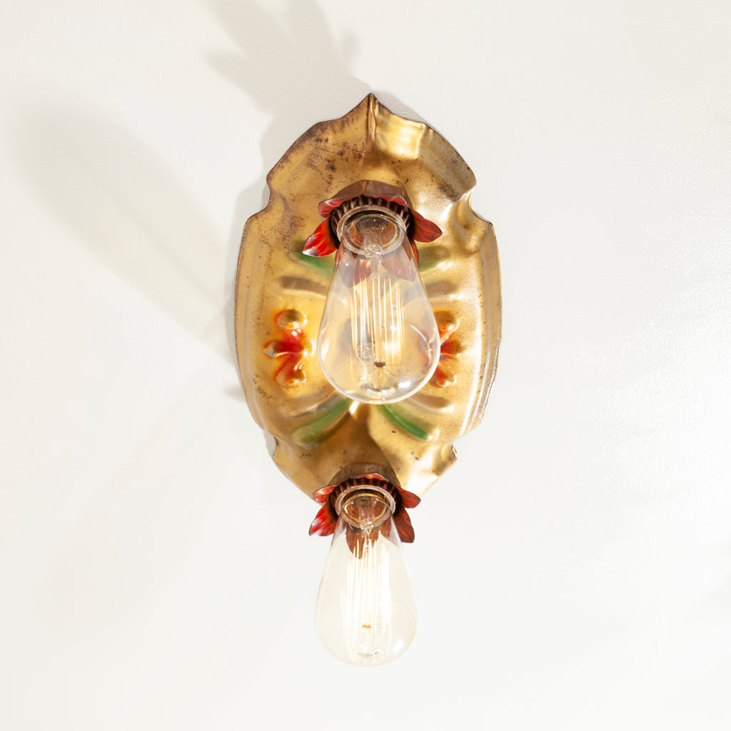this is a side view of a vintage bare bulb ceiling fixture shown with lightbulbs installed