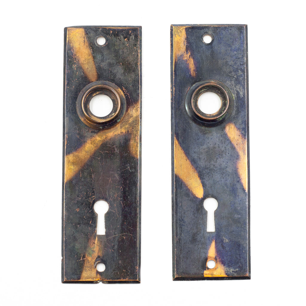 this is a pair of vintage copper flash japanned escutcheons