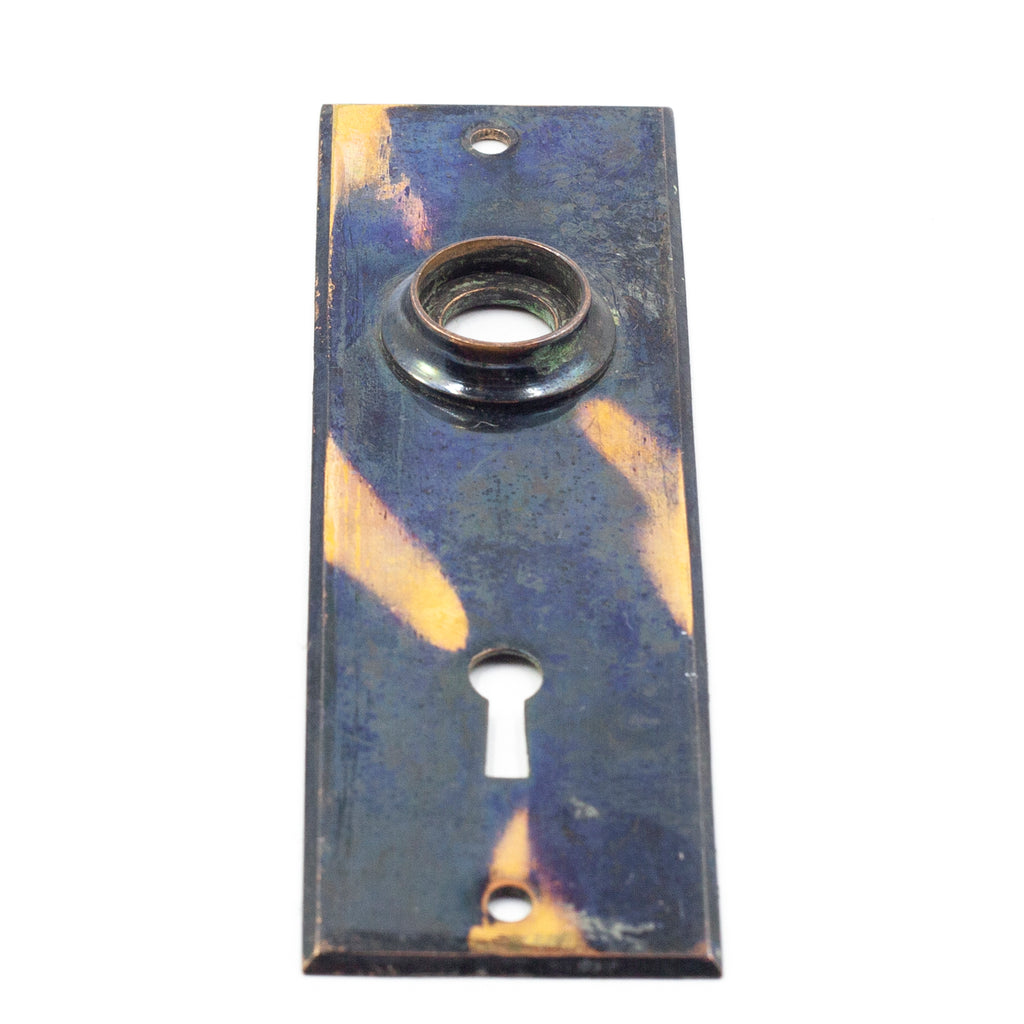 this is a picture of a vintage copper flash japanned escutcheon