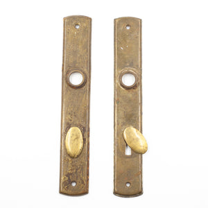 this is a pair of antique vintage european escutcheons with keyhole covers