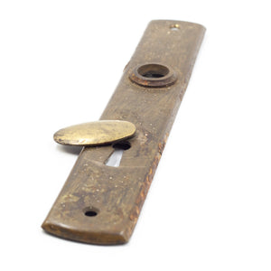 this is an up close picture of the keyhole cover on an vintage european escutcheon