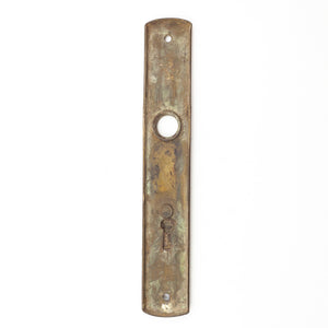 this is a picture of the back of a vintage escutcheon